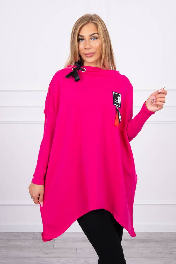 Kesi Oversize sweatshirt with asymmetrical sides of fuchsia color