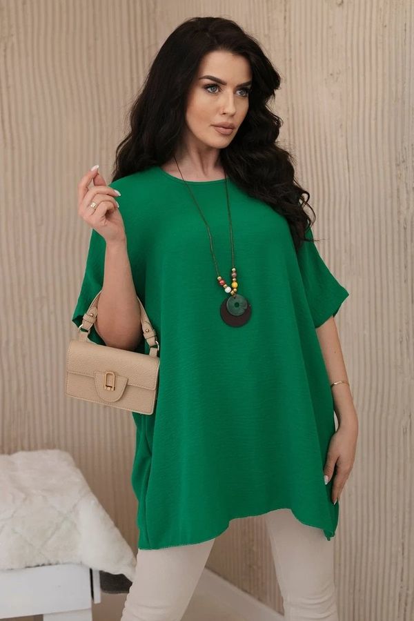Kesi Oversized blouse with a pendant in dark green color