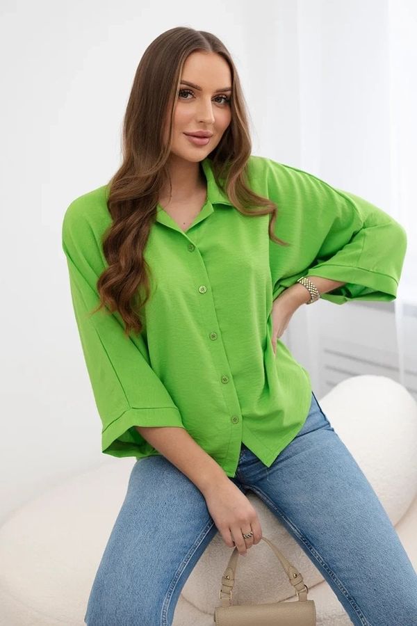 Kesi Oversized blouse with button fastenings in light green color