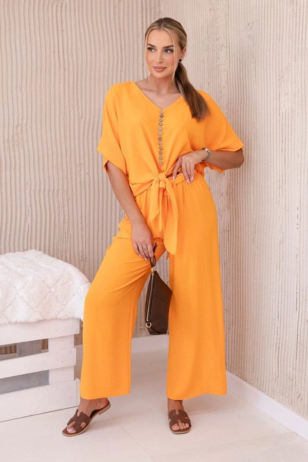Kesi Set of bright orange blouse and trousers