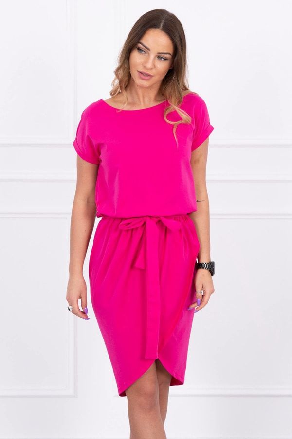 Kesi Tied dress with fuchsia clutch underneath