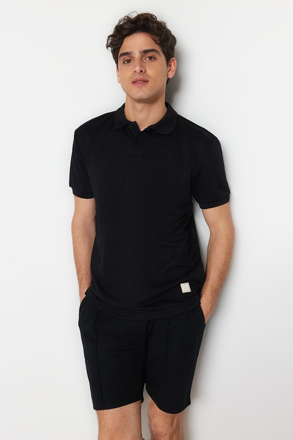 Trendyol Trendyol Black Regular/Regular Fit Short Sleeve Label Appliqué Polo Neck T-shirt