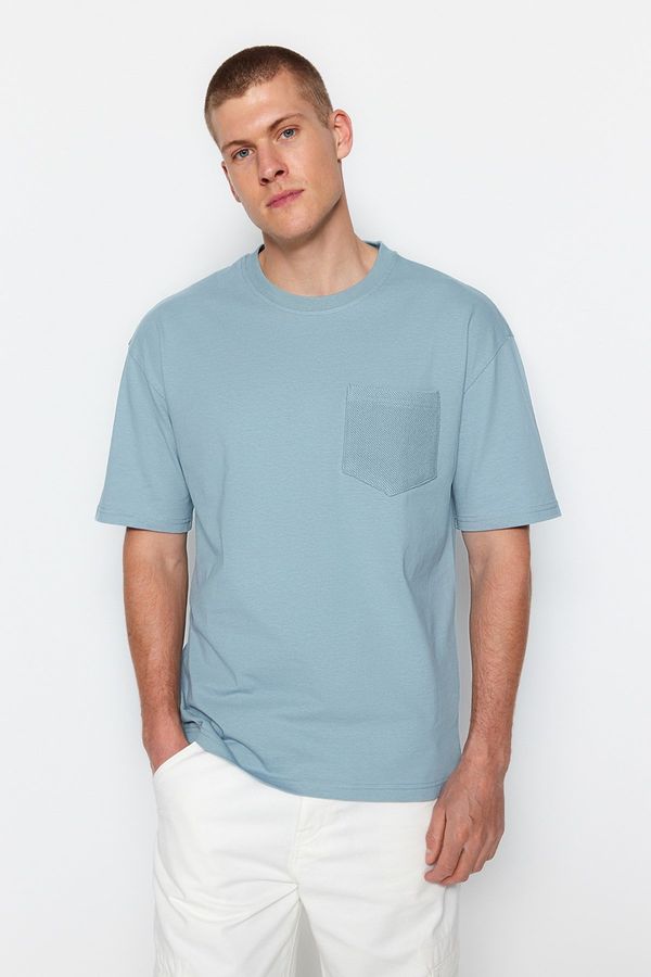 Trendyol Trendyol Blue Oversize/Wide Cut Short Sleeve Textured Pocket 100% Cotton T-Shirt