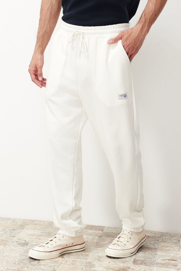 Trendyol Trendyol Ecru Regular Fit Label Appliqued Pockets Stitched Sweatpants
