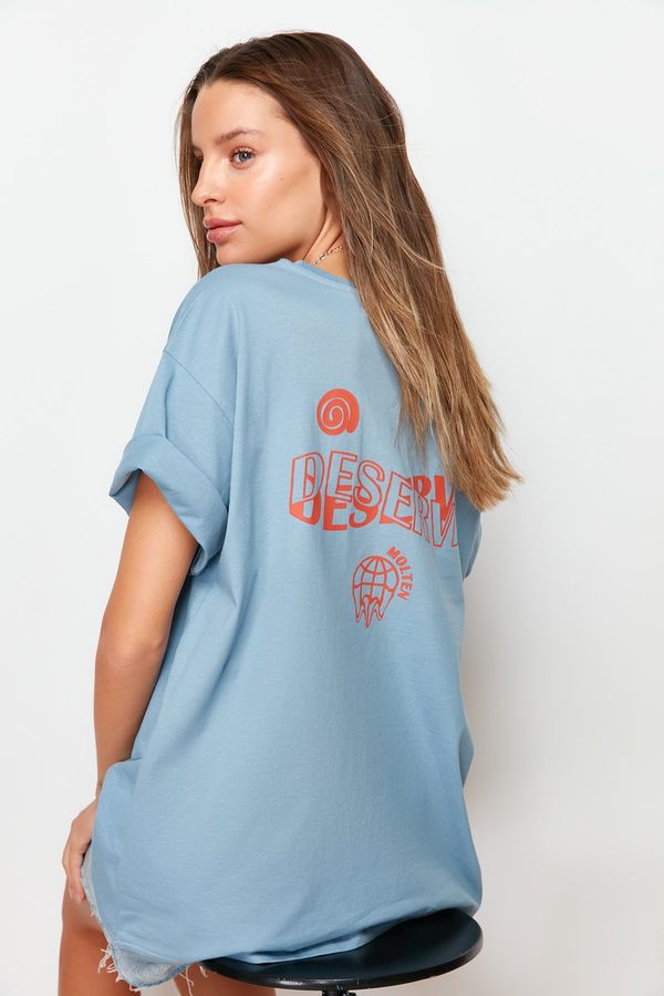 Trendyol Trendyol Indigo 100% Cotton Slogan Printed on the Back Boyfriend Fit Crew Neck Knitted T-Shirt