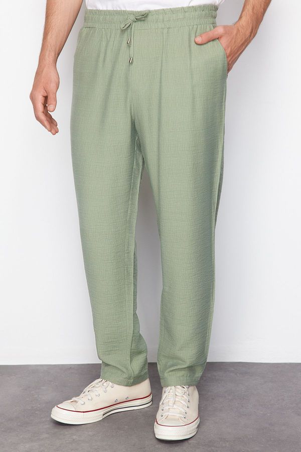 Trendyol Trendyol Light Khaki Tapered Elastic Waist Tied Linen Look Trousers