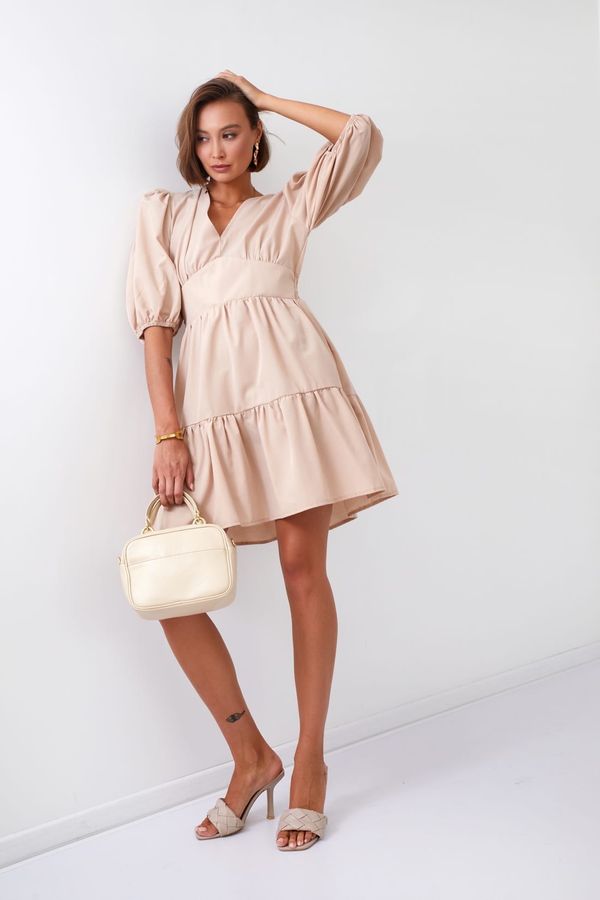 FASARDI Waist dress with puffed sleeves of beige color
