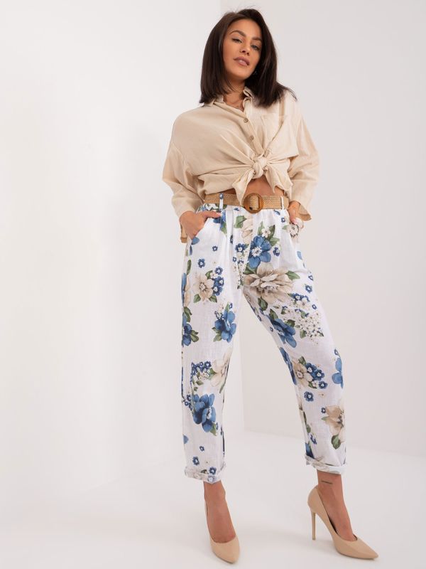 Fashionhunters White women's fabric trousers with flowers
