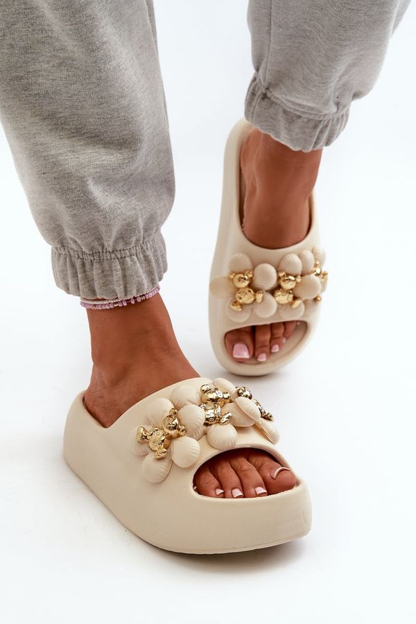 Kesi Women's foam slippers with embellishments on a thick sole, light beige Bremavia