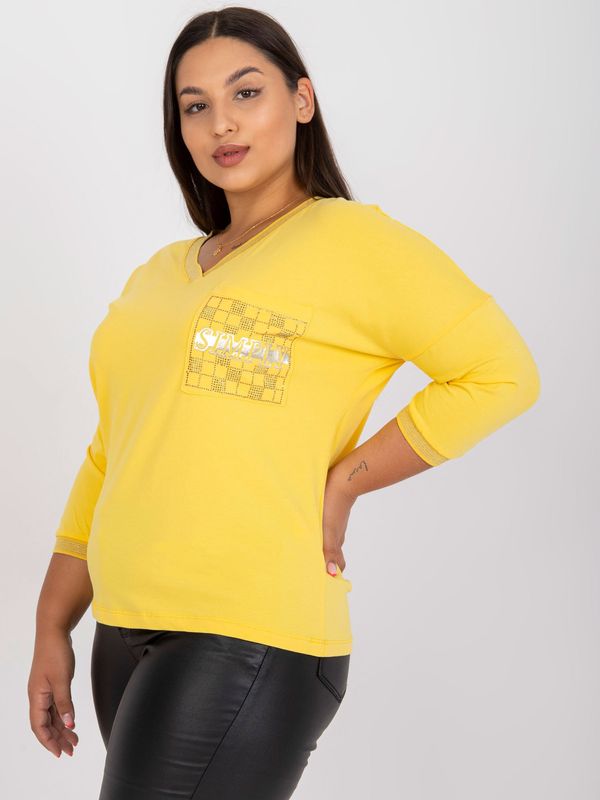 Fashionhunters Yellow cotton blouse of larger size with decorative pocket
