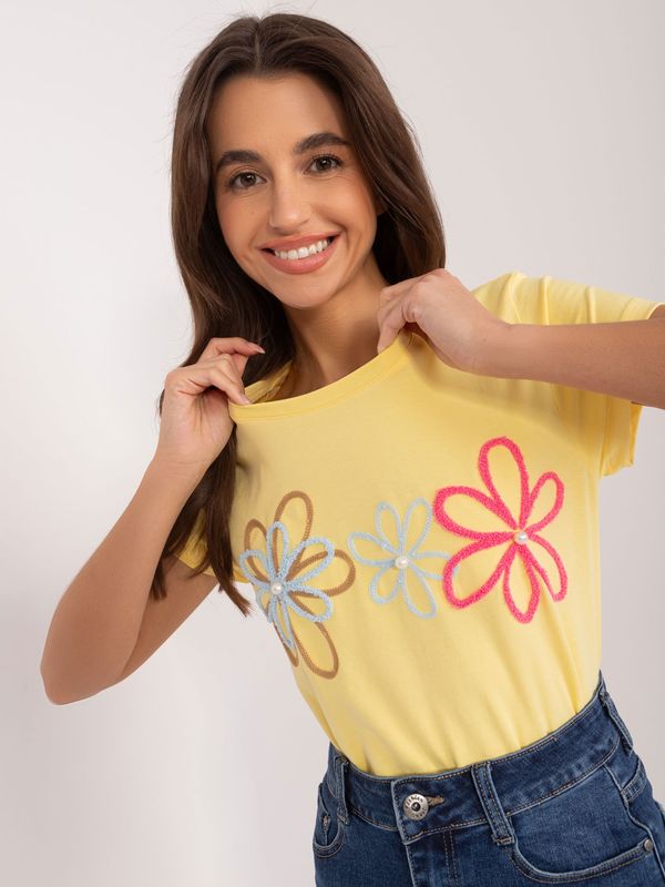 Fashionhunters Yellow T-shirt with floral appliqué BASIC FEEL GOOD