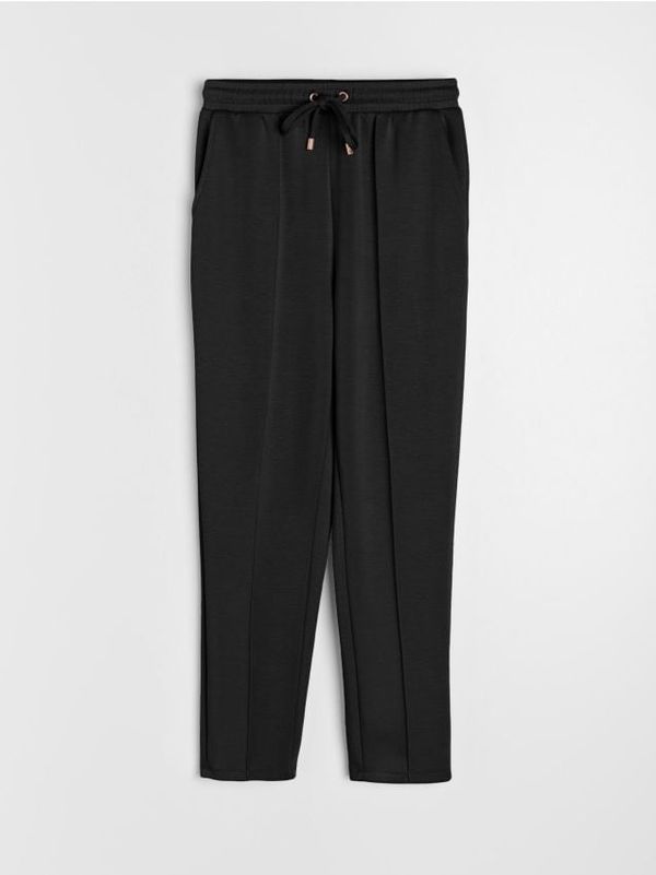 Sinsay Sinsay - Pantalone sa šavovima - crno